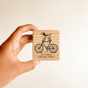 Ex libris · Perro en Bici
